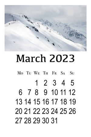 Calendar card for March 2023. Printable vertical wall calendar, week starts on Monday. Beautiful winter landscape in the Polish Tatra Mountains.の写真素材