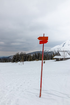 April 21, 2022 Zakopane Poland. Beautiful landscape in the Tatras. Information board on the trail for tourists.のeditorial素材