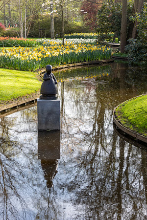 April 14, 2022 Lisse, The Netherlands. Beautiful public garden with blooming spring flowers. Popular tourist site.のeditorial素材