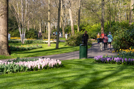 April 14, 2022 Lisse, The Netherlands. Beautiful public garden with blooming spring flowers. Popular tourist site.のeditorial素材