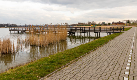 Landscape in the countryside by the lake. A quiet place to relax by the water.