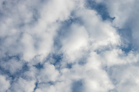 White clouds against a blue sky