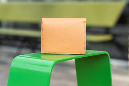 Wallet on a green stand and blur backgroundの写真素材