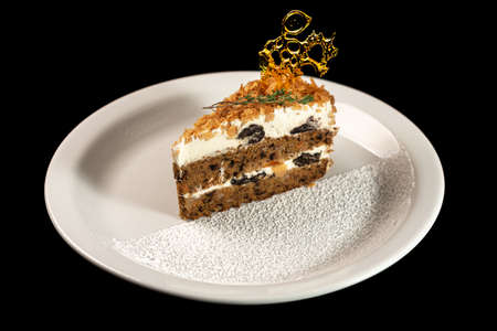 Delicious piece of cake on a white plateの写真素材