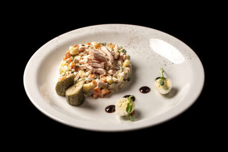 Olivier served beautifully on a white plateの写真素材