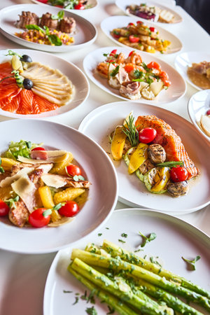 A selection of beautifully presented gourmet dishes, ideal for catering events and special occasions.の写真素材