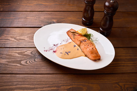 Grilled Salmon Fillet with Cream Sauceの写真素材