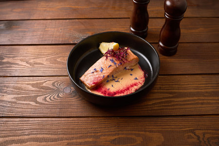 Gourmet Salmon Fillet in Creamy Sauceの写真素材