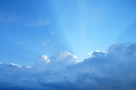 Light behind the clouds in the sky.