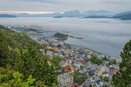 Alesund town with fog in the morning, Norway.の写真素材