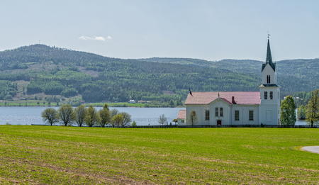 Church at lake Kroderen, Norway.の写真素材