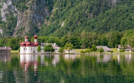Bartholomew church in Konigssee , the deepest, cleanest lake in Germany during summer season.