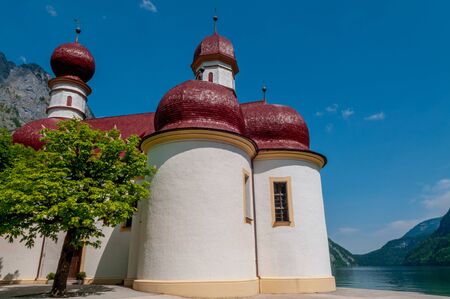 Bartholomew church in Konigssee , the deepest, cleanest lake in Germany during summer season.の写真素材