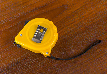 Tape measure on wood