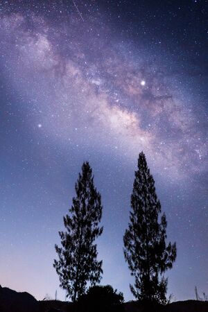 Panorama view of universe space shot of nebula and milky way galaxy with stars on blue night sky....