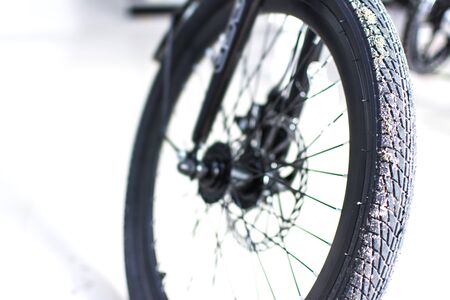 Close up wheel and chain of mountain biking. Landscape view of disc break system and front...