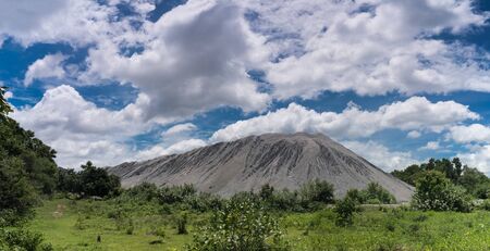 Scenery of Snow Mountain of U Thong Stone Mill Suphanburi, Thailand. Limestone mountains from mining...
