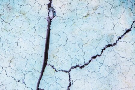 Close up of crack soil and muddy in the dry season textures, hot summer. Patterns and texture cracked soil of sunny dried earth soil, Drought of the ground. Dried cracked earth soil ground backgroundの写真素材