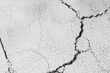 Close up of crack soil and muddy in the dry season textures, hot summer. Patterns and texture cracked soil of sunny dried earth soil, Drought of the ground. Dried cracked earth soil ground backgroundの写真素材