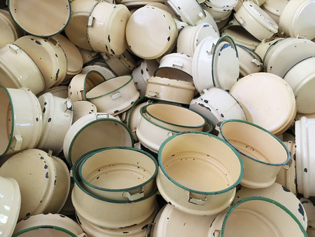 A bunch of beige metal food carrier;tiffinの写真素材