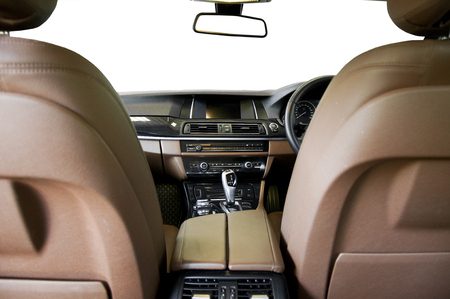 driver's seat, steering wheel and control panel in the modern car interiorの写真素材