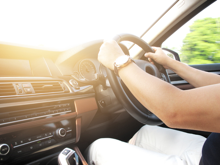 Man Driving Car Hand on Steering Wheel Vintage Filterの写真素材