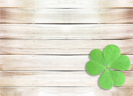 St. Patrick's Day  with A Green Shamrocks on Wooden Textureの写真素材
