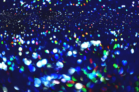 golden glitter texture Colorfull Blurred abstract background for birthday, anniversary, wedding, new year eve or Christmas.の写真素材
