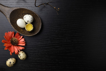 studio shot of eggs on a wooden background.の写真素材