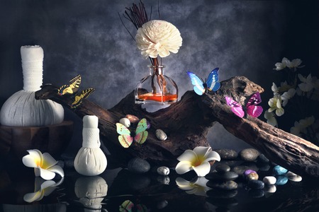 Composition of spa treatment and stone on table.の写真素材