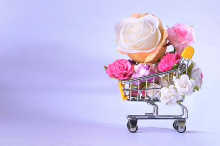 Love and happy Valentines day roses colorful in shopping cart.の写真素材