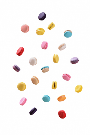 Colorful macarons or macaroons dessert sweet beautiful to eat fall on white background.の写真素材