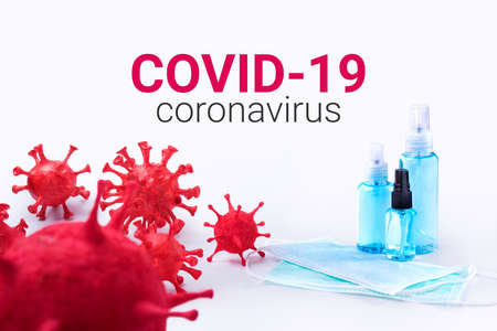 Coronavirus (COVID-19) that Built by molding clay painted has surgical masks and alcohol hand...