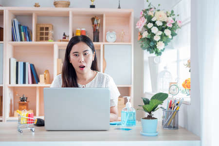 Woman showing of happiness after shopping online with the life style New Normal for self quarantine...