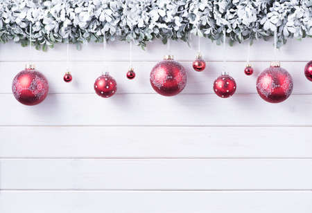 Balls baubles snow of Merry Christmas and Happy New Year decoration for celebration on white wood background with copy space.の写真素材