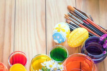 Happy Easter day colorful eggs and flower a set of food coloring, acrylic paintbrush for do it...