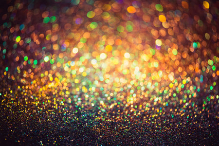 bokeh effect glitter colorful blurred abstract background for birthday, anniversary, wedding, new year eve or Christmas.の写真素材