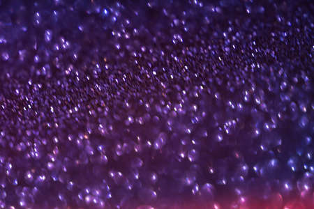 bokeh effect glitter colorful blurred abstract background for birthday, anniversary, wedding, new...
