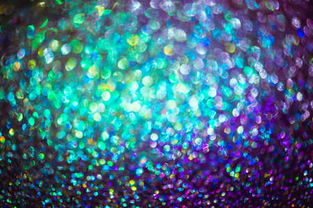 bokeh effect glitter colorful blurred abstract background for birthday, anniversary, wedding, new...
