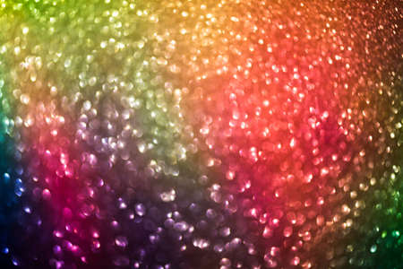 bokeh effect glitter colorful blurred abstract background for birthday, anniversary, wedding, new...