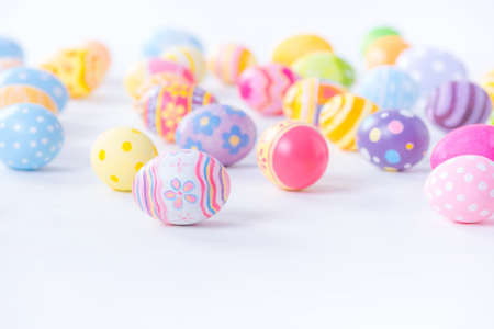 Happy Easter day colorful eggs and blurred on white background with copy space.
