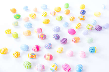 Happy Easter day colorful eggs and blurred on white background with copy space.の写真素材