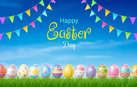 Happy Easter Day colorful egg on grass and beautiful blue sky background with copy space.