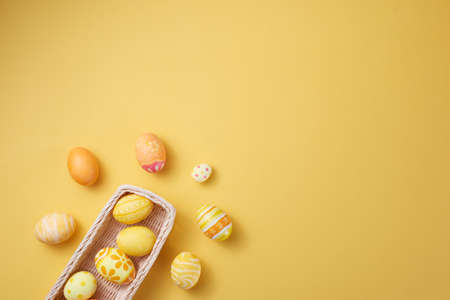 Happy Easter day eggs on paper background with copy space.