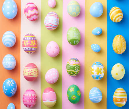 Happy Easter day colorful eggs on paper background.の写真素材