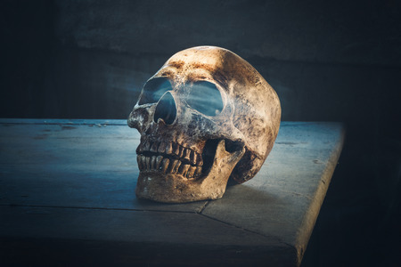 old skull on old sack with smoke