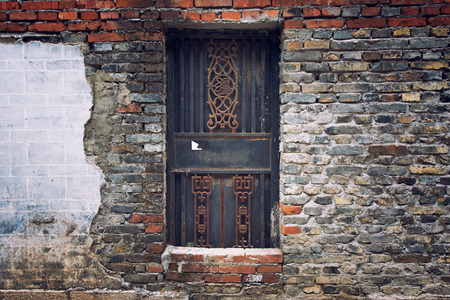 Traditional China residential door and brick wallの写真素材