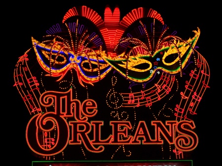 Las Vegas, USA - November 30, 2011: The lights of The Orleans Hotel and Casino Sign showcase the Mardi Gras theme of the property.  The Orleans was opened in Las Vegas, Nevada in the year 1996.のeditorial素材