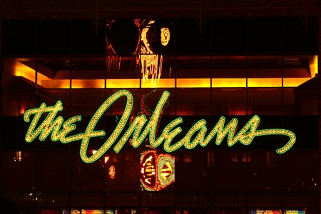 Las Vegas, USA - November 30, 2011: The lights of The Orleans Hotel and Casino Sign above the main entrance showcase the Mardi Gras theme of the property.  The Orleans was opened in Las Vegas, Nevada in the year 1996.のeditorial素材
