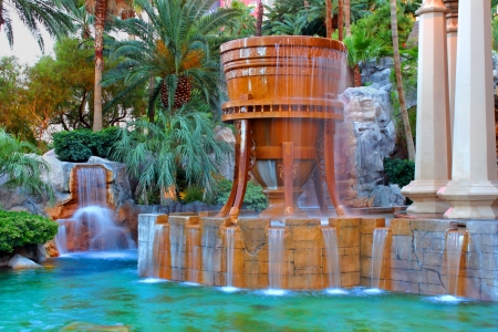 Las Vegas, USA - May 23, 2012: The Mandalay Bay Resort and Casino opened in 1999 in Las Vegas, Nevada.  Seen here is a fountain and pool near the entrance to the resort.のeditorial素材